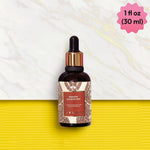 Day & Night Face Oil Duo: the Manjish Glow Elixir 1 fl oz (30 ml) dropper bottle against white marble above a yellow ribbed band. Badge: 1 fl oz (30 ml). Label: glow-giving night-time facial massage oil